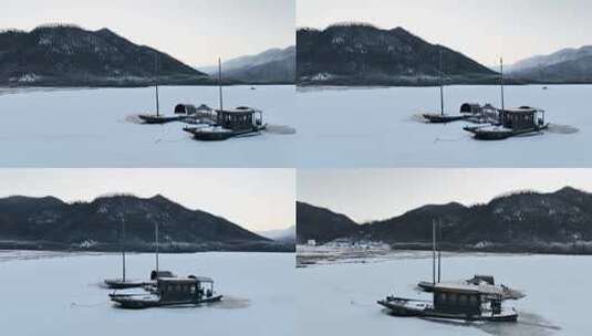 4K航拍冰封湖面小船高清在线视频素材下载