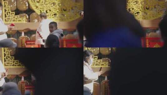 春节过年小孩在台上举着糖葫芦热闹温馨高清在线视频素材下载