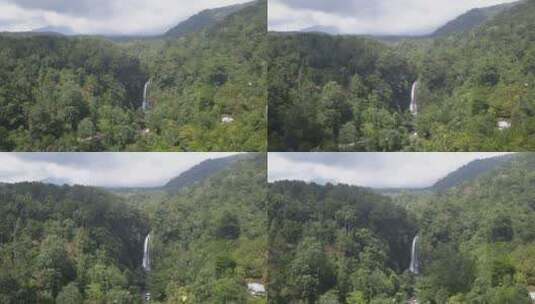 巴厘岛北部茂密的丛林山谷飞向引人注目的高瀑布高清在线视频素材下载