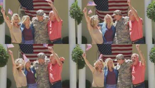 士兵和家人在国旗前拥抱高清在线视频素材下载