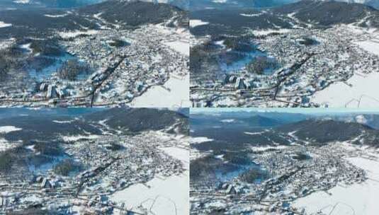 鸟瞰白雪覆盖的巴库里亚尼，周围是美丽的雪山。乔治亚州2021高清在线视频素材下载