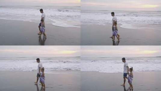 爸爸和女儿在海边散步高清在线视频素材下载