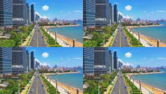 青岛东海路：高楼大厦蓝天白云海岸线航拍高清在线视频素材下载