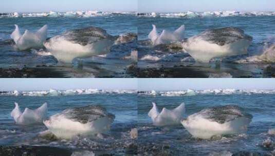 海浪拍打一块块冰川高清在线视频素材下载