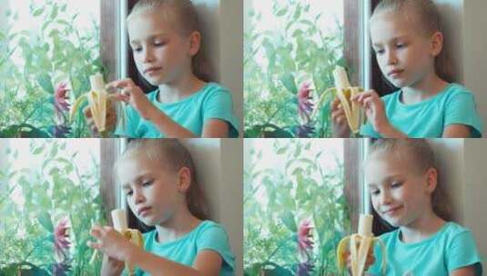 小女孩在剥香蕉皮高清在线视频素材下载