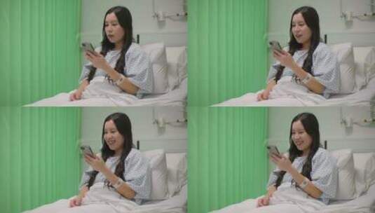 在病床上玩电话的女人高清在线视频素材下载