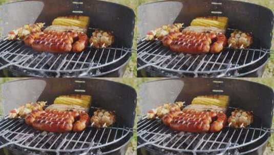 香肠玉米在火炉上烧烤高清在线视频素材下载