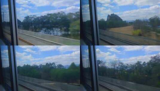 行驶中的高铁动车窗外蓝天白云自然风景高清在线视频素材下载