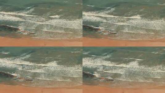 俯拍海浪拍到沙滩竖屏高清在线视频素材下载