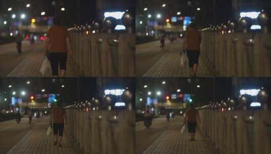老人孤独的走在路上城市夜景高清在线视频素材下载