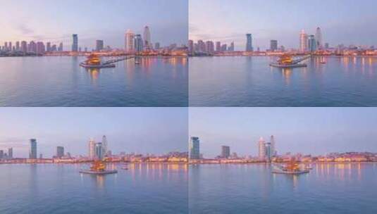 4K航拍青岛栈桥夕阳海景高清在线视频素材下载