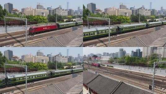 北京火车站外进出站的绿皮火车高清在线视频素材下载