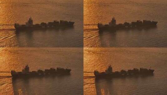 4K航拍夕阳集装箱轮船出海驶出港口高清在线视频素材下载