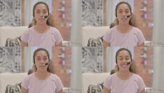 戴着耳机与客户交谈的非裔美国女性肖像高清在线视频素材下载