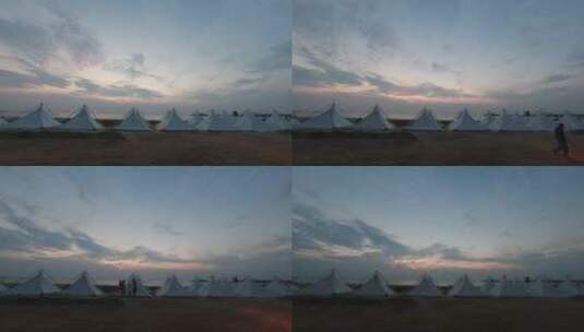 山东威海威高海洋公园沙滩帐篷晚霞延时4K高清在线视频素材下载