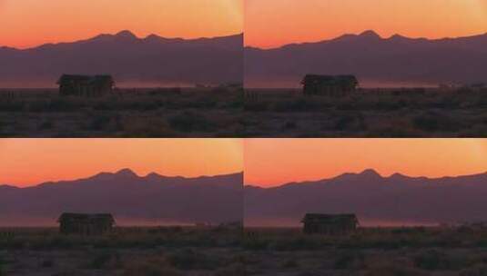 日落时平原上的小木屋高清在线视频素材下载