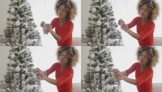装饰圣诞树的迷人女人高清在线视频素材下载