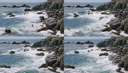 海浪在冲击岸边的岩石高清在线视频素材下载