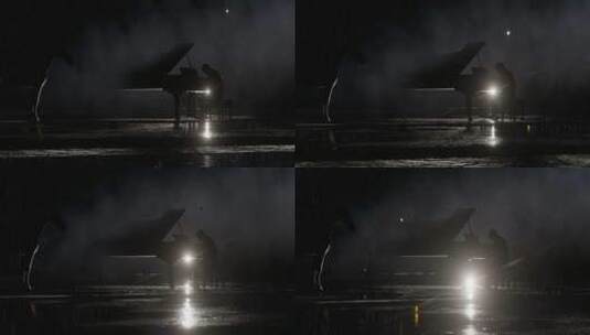 雨中台上弹钢琴高清在线视频素材下载