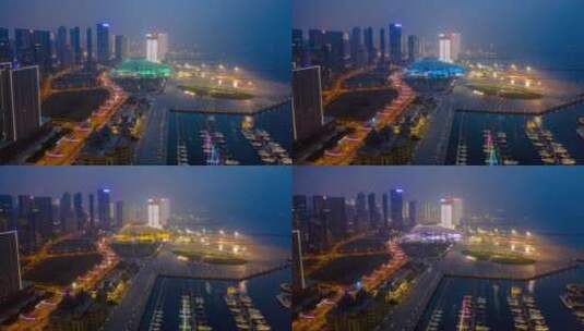 大连东港游艇码头会议中心夜景航拍移动延时高清在线视频素材下载