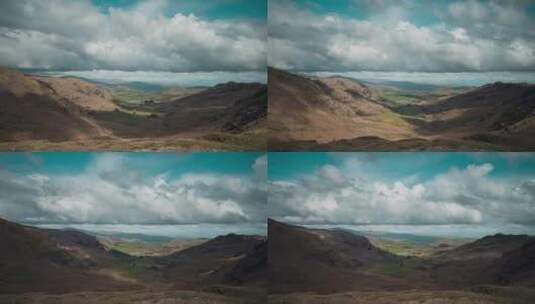 乌云下的山脉的延时拍摄景观高清在线视频素材下载