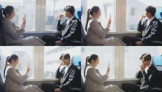 一对幸福的亚洲情侣在高铁里拍照留影高清在线视频素材下载