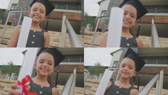 快乐的高加索女孩戴着毕业帽拿着文凭的视频高清在线视频素材下载