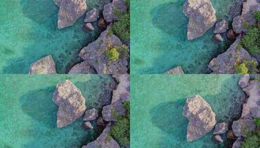 多米尼加共和国佩德纳莱斯巴伊亚德拉斯阿吉拉斯热带海岸巨石的俯视图高清在线视频素材下载