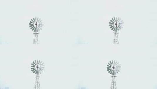 地拍武汉雨后铁皮风车高清在线视频素材下载
