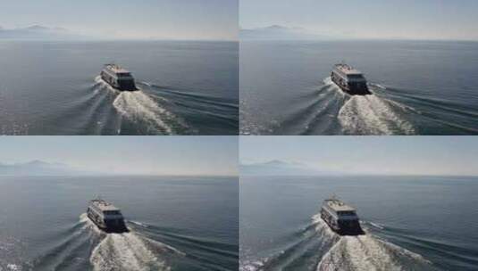日内瓦湖上向地平线移动的旅游船天线高清在线视频素材下载