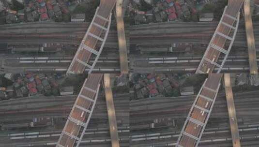 湖南衡阳城市高架桥下穿梭货运火车头航拍高清在线视频素材下载