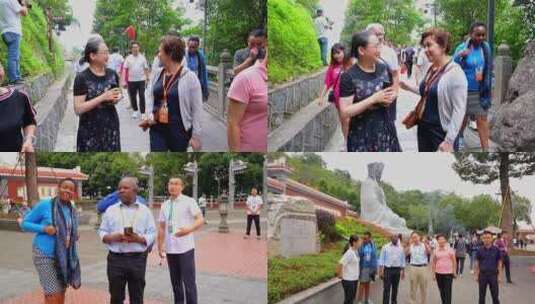 导游带外国游客参观中国景区高清在线视频素材下载