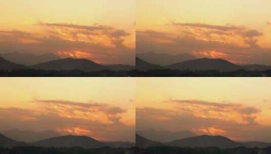 山峰黄昏夜幕降临晚霞橙色天空唯美风景高清在线视频素材下载