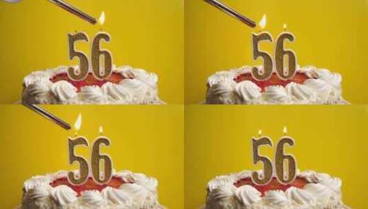 56.点燃数字56形式的蜡烛，插在节日蛋高清在线视频素材下载
