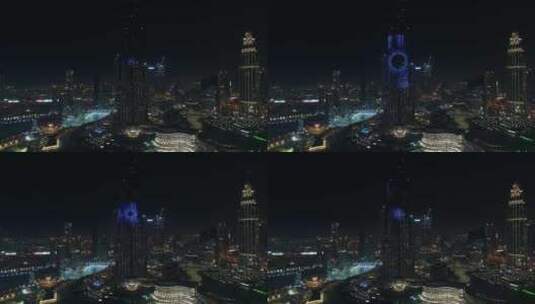 迪拜夜间灯光表演的哈利法塔鸟瞰图。高清在线视频素材下载
