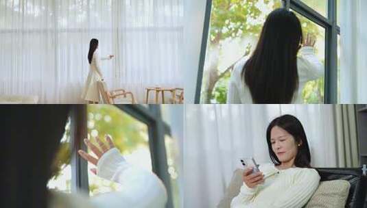 女生休闲居家拉窗帘高清在线视频素材下载