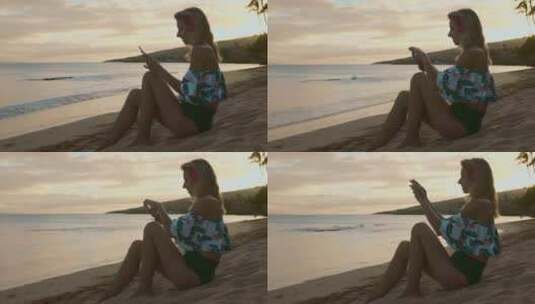 女孩坐在沙滩上高清在线视频素材下载