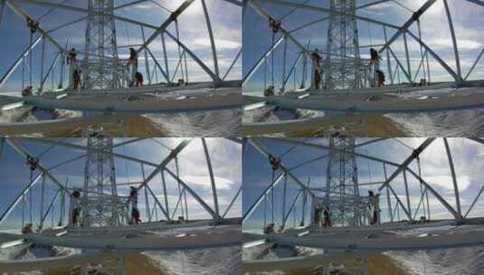4K西藏5200米雪山铁塔组立施工横担吊装09高清在线视频素材下载