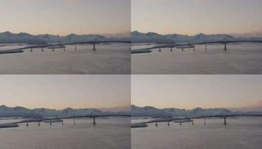冬季，挪威特罗姆瑟，斯堪的纳维亚半岛索马罗伊岛的桥梁——无人机空中拍摄高清在线视频素材下载