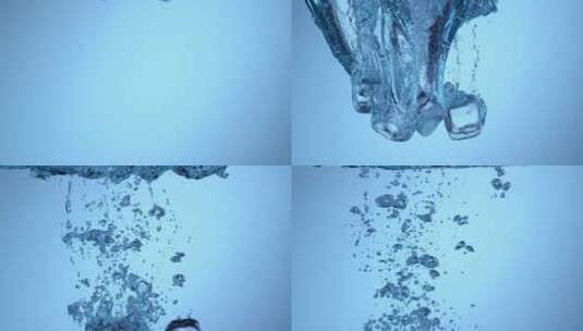 冰块掉入了水里的特写高清在线视频素材下载