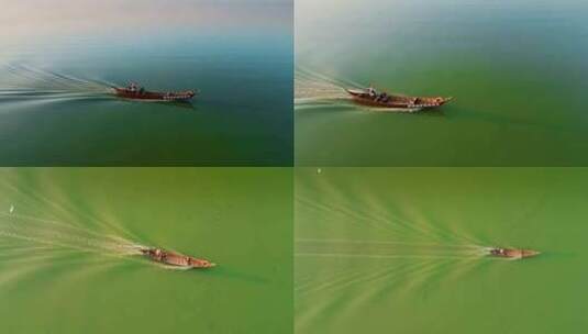 昆明滇池绿藻水面一只飞行捕捞船高清在线视频素材下载