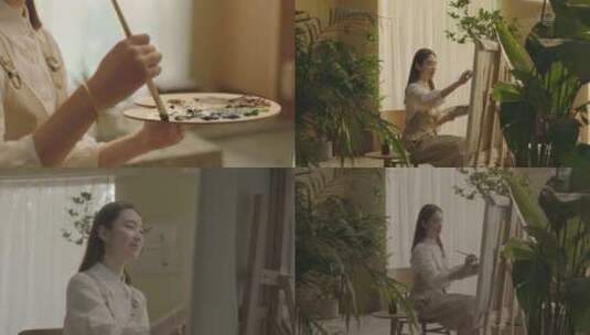 女画师在家中画画高清在线视频素材下载