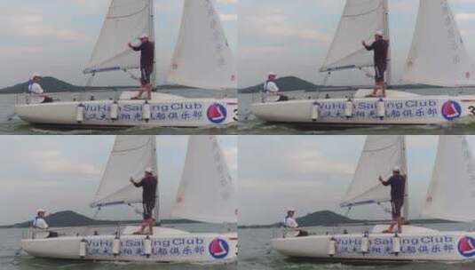 武汉东湖地拍帆船航行人高清在线视频素材下载