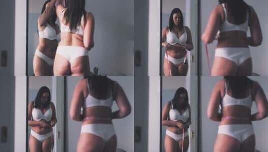 女人照镜子给自己测量腰围高清在线视频素材下载