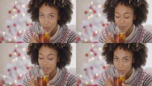 女人啜饮着热柠檬茶高清在线视频素材下载