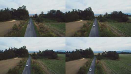 航拍汽车通过乡村公路高清在线视频素材下载