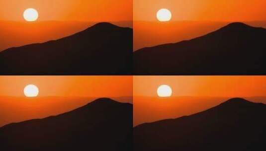 美丽的普通日落在轮廓分明的山后面高清在线视频素材下载