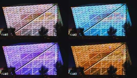 现代城市建筑玻璃幕墙夜景绚烂灯光高清在线视频素材下载