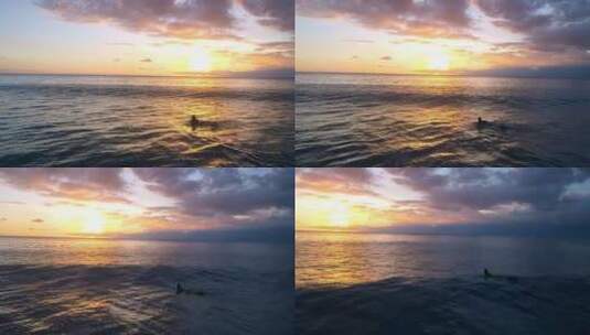 在夕阳下冲浪的女人高清在线视频素材下载