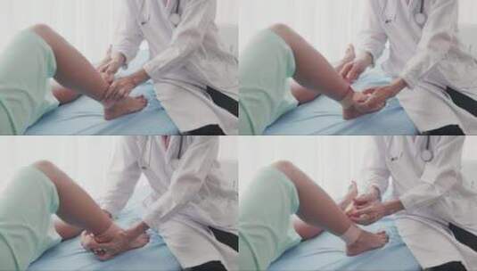 医生在医院给受伤的病人腿上敷绷带高清在线视频素材下载